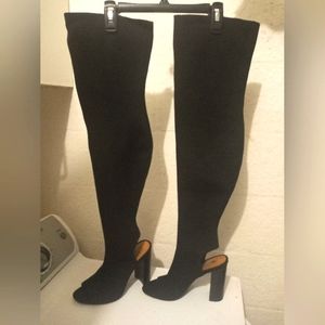 Steve Madden black over the knee heeled boots.